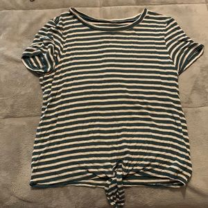 This green, white, and tan striped top is from American Eagle and is a small.